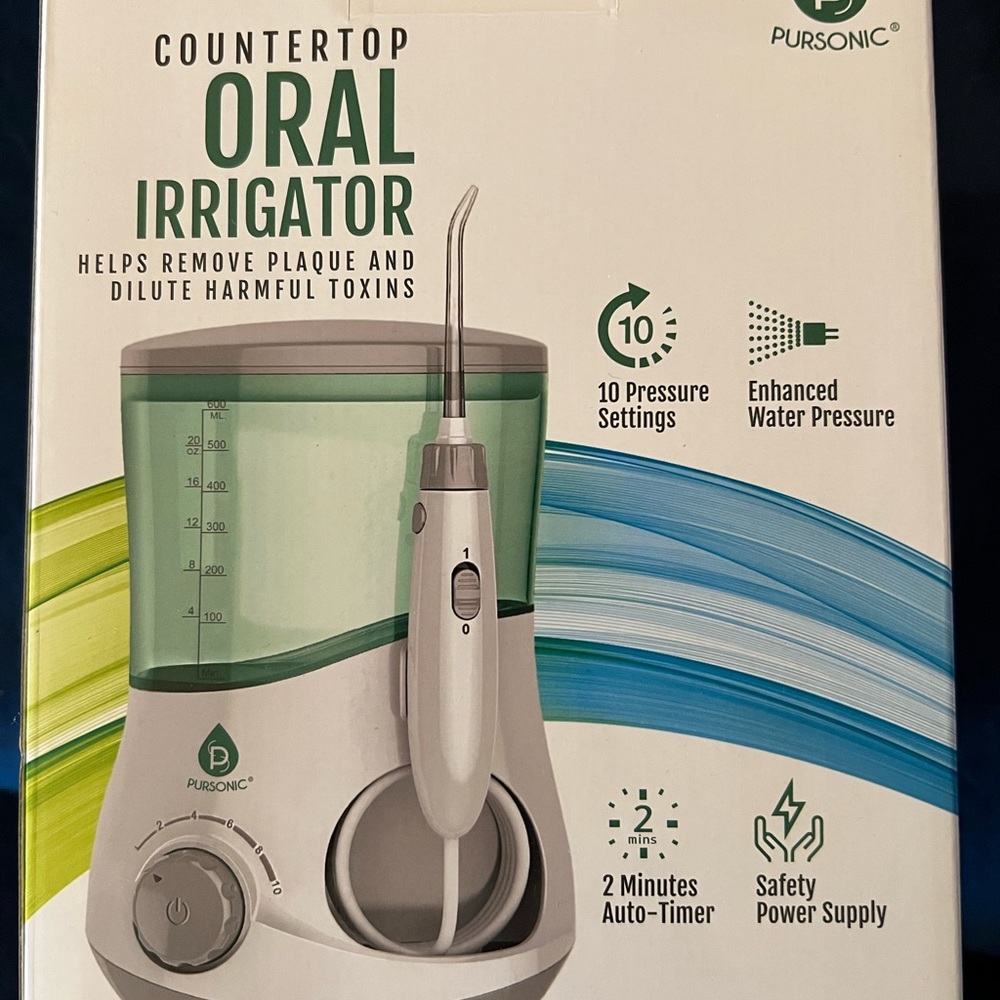 Oral irrigator